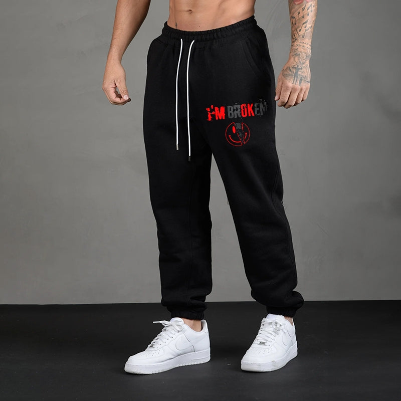 I’M BROKEN AND SMILING FACE SKULL GRAPHIC CASUAL PRINT JOGGERS