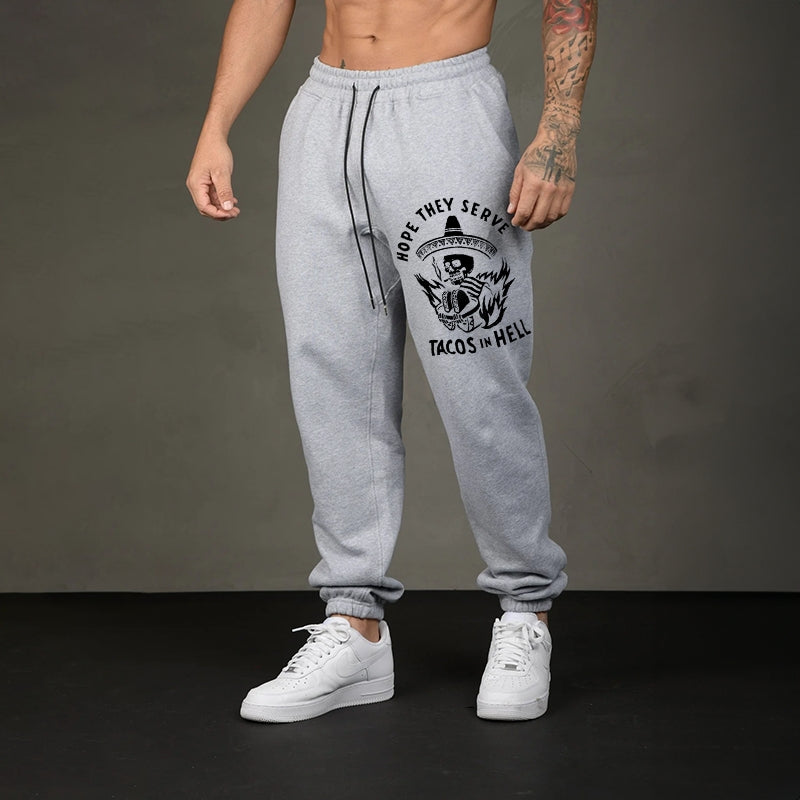 HOPE THEY SERVE TACOS IN HELL SMOKING SKULL GRAPHIC PRINT JOGGERS