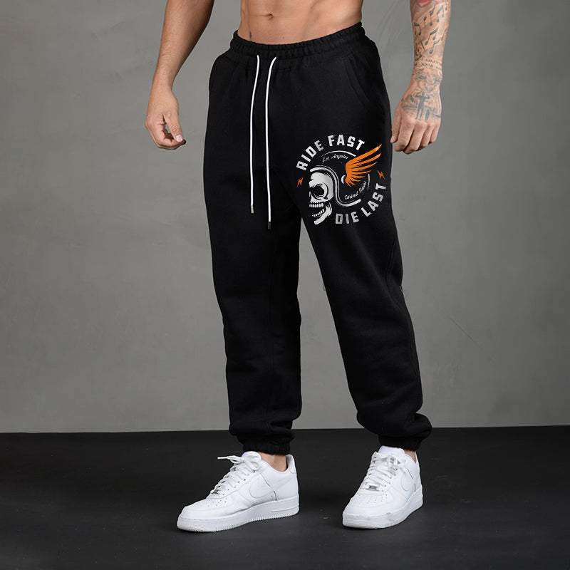 RIDE FAST DIE LAST CRAZY SKULL WITH A WINGS HELMET GRAPHIC PRINT JOGGERS