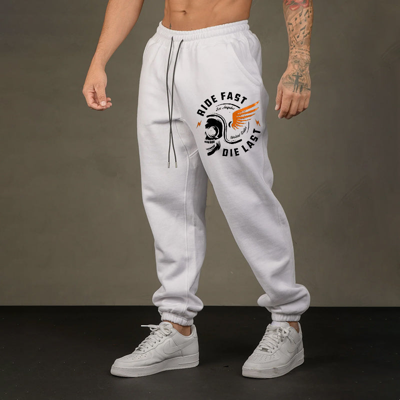 RIDE FAST DIE LAST CRAZY SKULL WITH A WINGS HELMET GRAPHIC PRINT JOGGERS