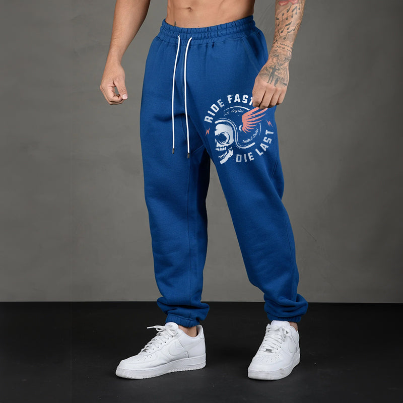 RIDE FAST DIE LAST CRAZY SKULL WITH A WINGS HELMET GRAPHIC PRINT JOGGERS